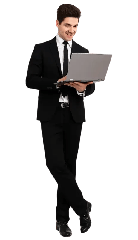 Smiling businessman in formal attire using a laptop, representing growth-focused digital career opportunities at BitBop